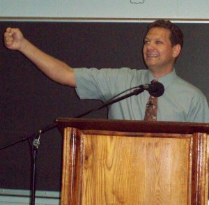 Rev. Jacques Roets urges graduates to "Preach the Word."